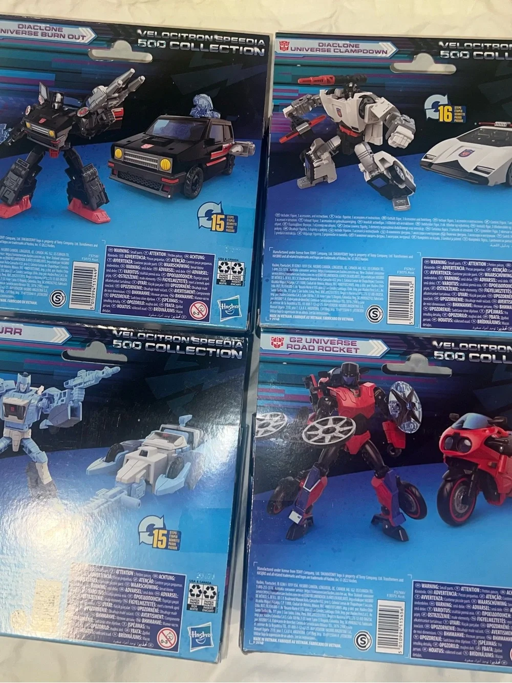 Takara Transformers Velocitron Speedia 500 Collection - White, Red, Black, Blue